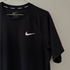 Nike Men's Black Tee with White Swoosh